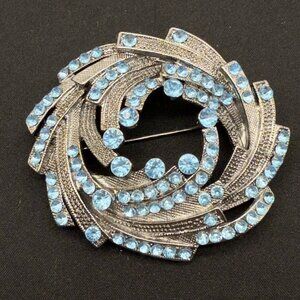 Vintage Silver-Tone Brooch With Light Blue Rhinestones Swirl Textured